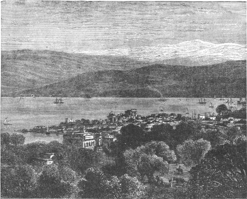 three children rolling a huge snowball