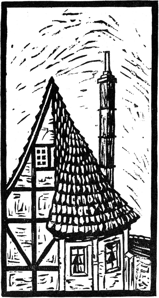 Vorderfront eines Hauses mit
  überdachtem Erker