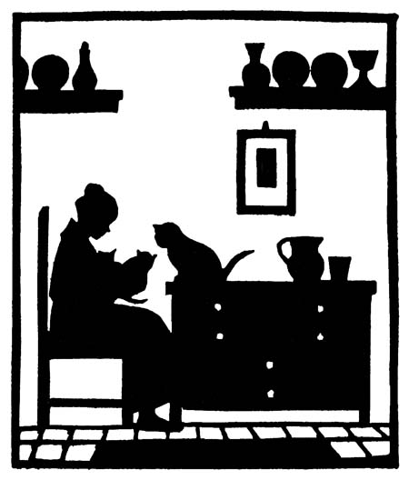 Miss Winifred holding the kittens